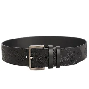 Black embossed leather belt detail with metal buckle and exquisite dragon pattern.