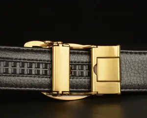 Close-up view of men's leather belt automatic buckle and textured strap details.