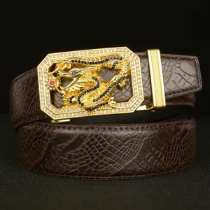Men's leather belt featuring a gold rhinestone dragon automatic buckle and crocodile pattern.