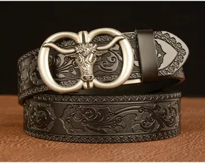 Detail view of the stylish men's black embossed leather belt featuring a metal bull buckle.