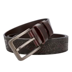 Men's embossed leather belt detail, dark brown cowhide casual belt close up view shot.