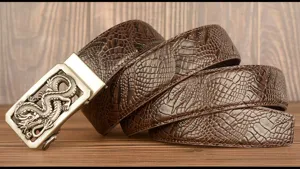 Retro men's leather belt featuring crocodile pattern and vintage dragon automatic buckle.
