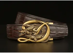 Close-up detail of mens brown leather belt with metallic crocodile buckle and texture.