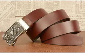 Detailed view of men brown cowhide leather belt featuring metal dragon automatic buckle.
