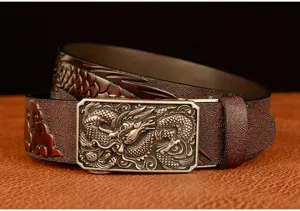 Close-up detail of men's leather belt with metallic dragon buckle and embossed strap.