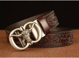 Detail view of men's embossed leather belt featuring bull head metal automatic buckle.