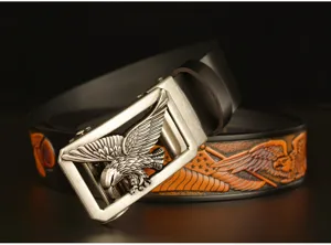 Men's genuine leather belt featuring a detailed metal eagle buckle and embossed strap.