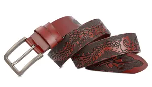 Detailed view of carved dragon leather belt with vintage metal buckle in rich brown finish.