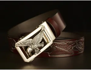 Men's genuine leather belt close-up, featuring detailed metallic eagle automatic buckle.