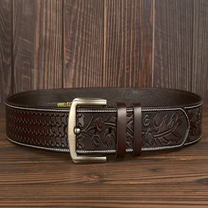Detailed view of carved men cowhide leather belt showing intricate embossed patterns and buckle.
