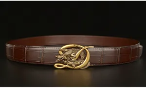 Closeup detail of men's brown embossed cowhide leather belt featuring a luxury gold crocodile buckle.