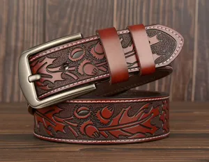 Men's vintage embossed leather belt with intricate floral tooling and durable metal buckle.