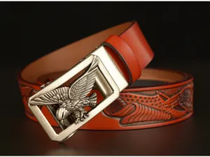 Men's leather belt with metal eagle automatic buckle and embossed strap details.