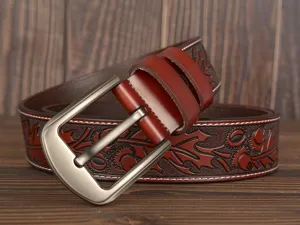 Embossed floral men's leather belt with vintage metal pin buckle, casual brown leather strap design.