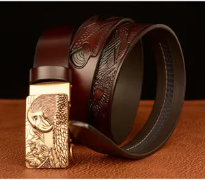 Men leather belt with eagle head automatic buckle and embossed pattern detailed view.