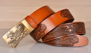 Embossed leather belt with eagle buckle and detailed wing patterns for men daily wear.