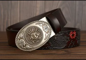 Men's leather belt detail view showcasing intricate embossed dragon buckle and premium cowhide strap.