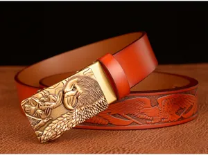 Close-up of mens leather belt featuring metal eagle buckle and detailed embossed eagle patterns.
