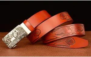 Men's brown cowhide leather belt with stylish eagle head automatic buckle and embossed pattern.