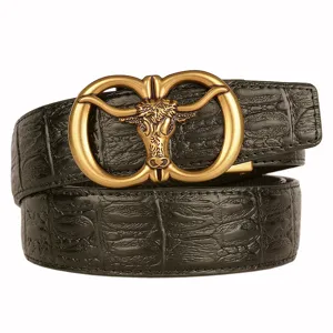 Men's black leather belt with retro gold bull head automatic buckle for fashion wear.