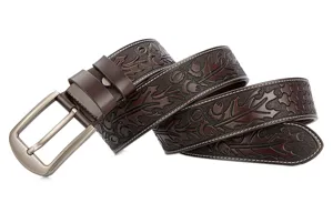 Detailed view of dark brown carved leather belt with vintage metal buckle and fine stitching.