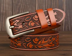 Men's vintage carved cowhide leather belt, stylish embossed floral design for casual jeans.