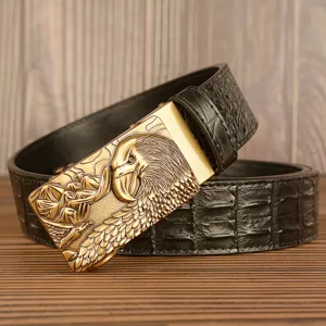 Mens leather belt with gold eagle automatic buckle and stylish crocodile embossed strap design.