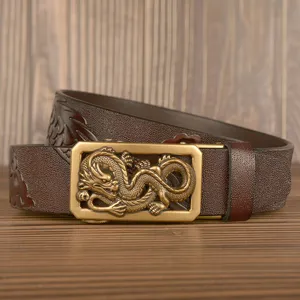 Men's brown leather automatic buckle belt with 3D carved golden dragon design coiled.