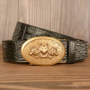 Men vintage leather belt with crocodile pattern and golden three-wolf head automatic buckle.