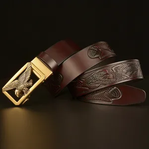 Men's leather belt with gold eagle automatic buckle and embossed strap design.