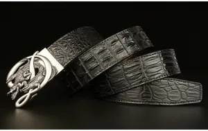 Men's leather belt detail view showcasing crocodile pattern texture and metal buckle.