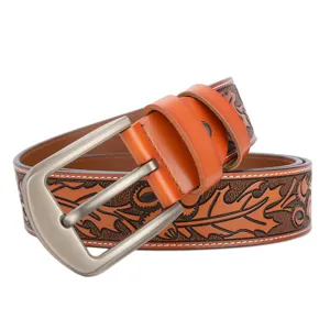 Detailed shot of men's genuine leather embossed belt with vintage metal pin buckle.