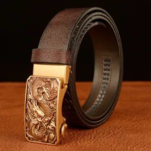 Men's leather dress belt featuring an automatic metallic dragon embossed buckle for casual jeans.