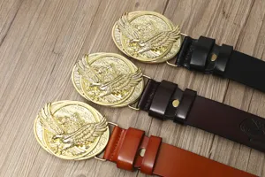 Men's casual cowhide leather belt with retro golden eagle buckle and stylish carved design.