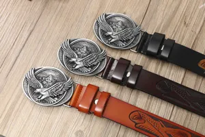 Men's vintage leather belt with striking eagle metal buckle and carved strap design casual.