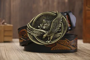 Detailed view of men leather belt featuring vintage bronze eagle buckle and carved strap.