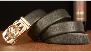 Detailed close-up of men's black genuine leather belt featuring gold rotating automatic buckle.