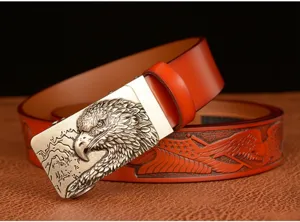 Men's genuine leather belt with metallic eagle head automatic buckle and embossed eagle strap.