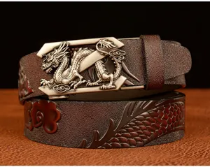 Detailed close-up of the exquisite dragon metal buckle and embossed leather texture on men's belt.