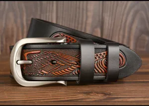 Men's leather belt with vintage carved eagle pattern and metal pin buckle for jeans.