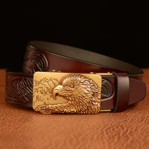 Men's leather belt with eagle head metal automatic buckle and carved cowhide strap stylish.
