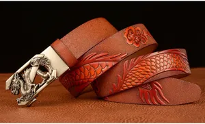 Detailed shot of men genuine leather automatic buckle belt with embossed dragon pattern.