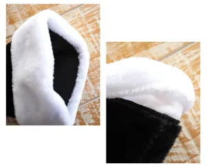 Black white plush Christmas hat detail close up, soft cozy winter holiday party costume accessory.