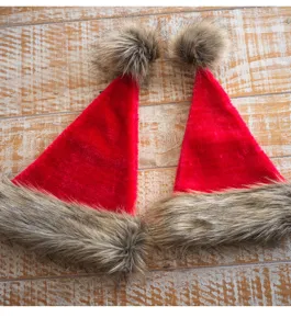 Red and brown plush Santa hat adult holiday party hat with fluffy faux fur brim and pom pom.