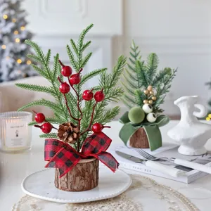 Mini Christmas tree table decoration with wood base, artificial pine branches and red berries