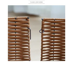 Detailed view of plastic rattan Christmas tree skirt with metal hook connection, elegant design.