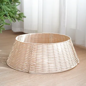 Detailed view of plastic rattan Christmas tree collar, hand-woven minimalist tree skirt base for holiday decor.