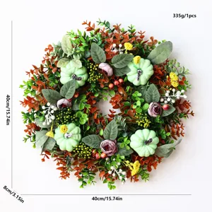 Detailed view of the autumn wreath showing pumpkins, berries, and foliage craftsmanship features.