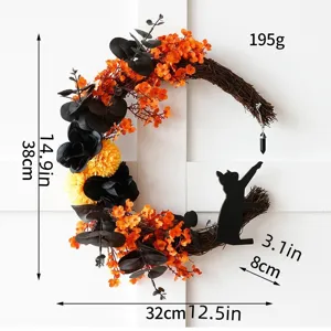 Halloween crescent moon wreath featuring black roses orange flowers and cat pendant