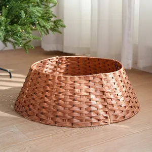 Detailed view of the brown plastic rattan Christmas tree collar base for holiday decor.
